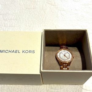 Brand new Michael Kors watch. Has never been worn, and is in perfect condition.